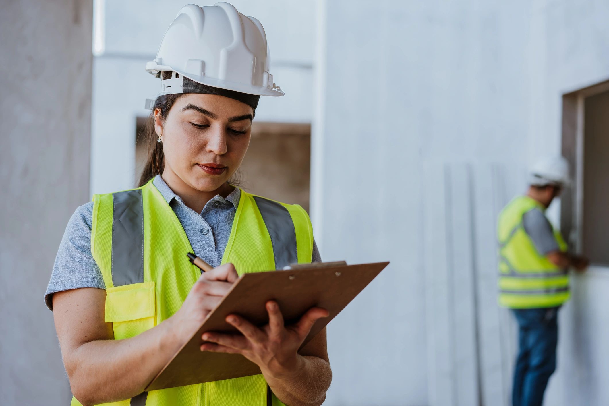 Engineer reviewing fire protection plans on a construction site