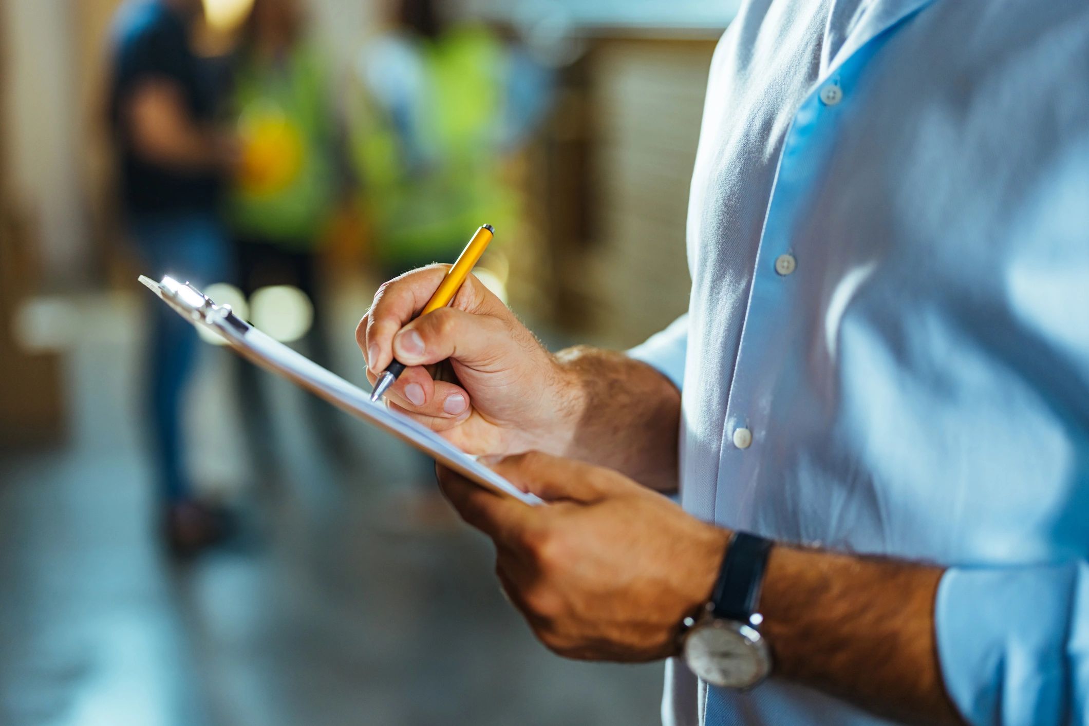 Fire safety engineer taking notes during a site inspection